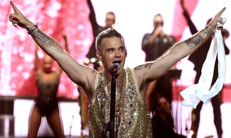 ‘Now scream!’ … Robbie Williams performing at the O2, London, 9 October 2022.
