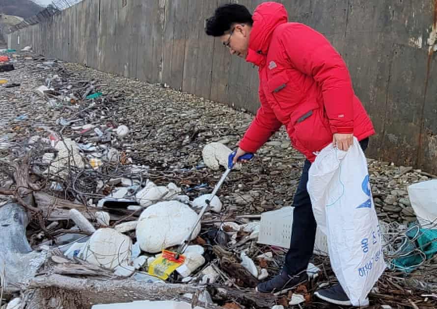 ‘The most surprising thing was how much garbage made it here’ … Kang Dong-wan at work on Yeonpyeong.