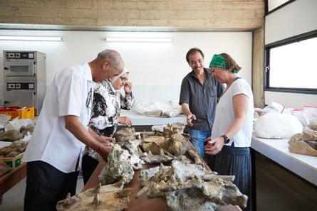 Driss Ouarhache, Dr Khadija Boumir, Dr Ahmed Oussou and Prof Susannah Maidment looking at the Spicomellus afer fossil