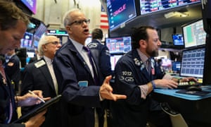 Traders on the floor of the New York Stock Exchange