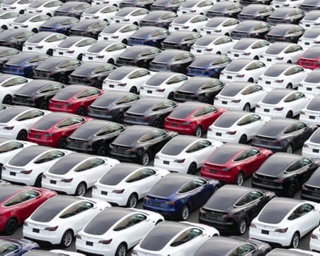 Tesla vehicles in a parking lot