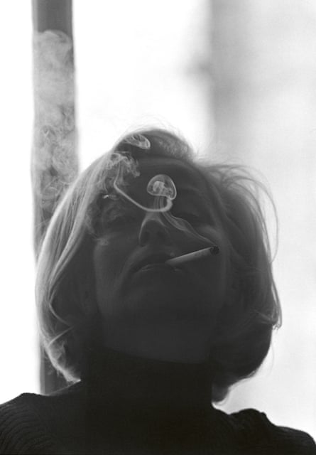 Gallerist Holly Solomon smoking a cigarette, circa 1970