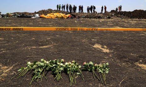Flowers at the scene of a plane crash in Bishoftu, Ethiopia
