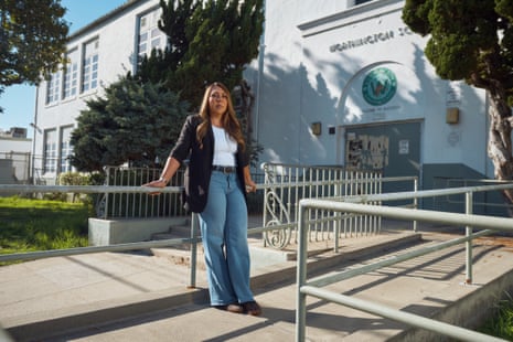 Woman successful blazer and jeans leans connected tube obstruction extracurricular school.