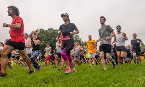 Participants take part in Parkrun, where many thousands of people of all levels of fitness can walk, jog or run 5km together.