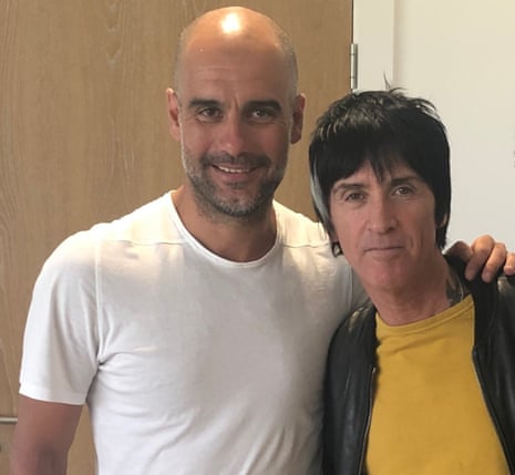 Manchester City FC manager Pep Guardiola (on left) and musician Johnny Marr