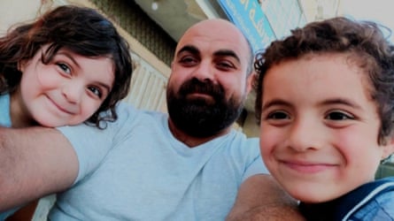A selfie taken by Hamdi with two of his children