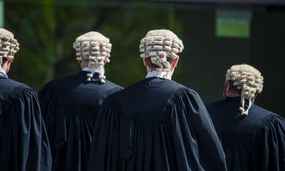 Barristers are seen outside the Supreme Court in Brisbane