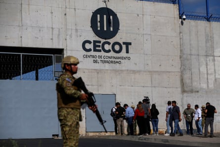 A Salvadoran soldier stands guard outside the Terrorism Confinement Centre (Cecot) prison, in Tecoluca, El Salvador.