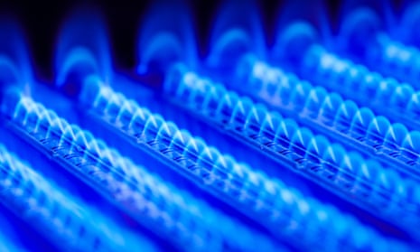 Burning gas in water heater furnacePropane flame inside of gas boiler furnace