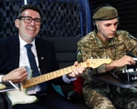 Andy Burnham jamming in a mobile recording studio near Ukraine’s front line, in Kyiv on 24 August.