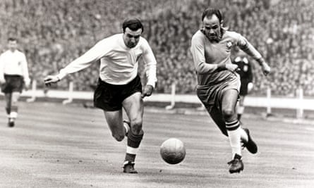 England’s Jimmy Armfield puts the pressure on Brazil’s Pepe in 1963.