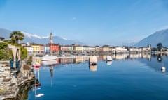 Panorama Of Ascona With Houses With Colorful Facades Reflecting On Lake Maggiore<br>Photo taken in Ascona, Switzerland