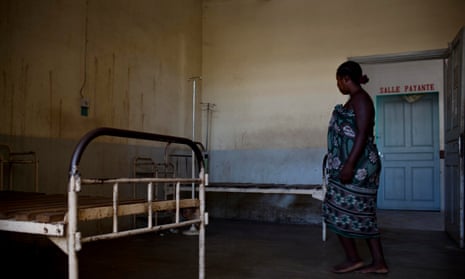 A woman walks through a badly maintained hospital ward in the general hospital in Morondava, Madagascar