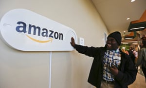 Zavian Tate, a student at the University of Alabama at Birmingham, pushes a large Amazon Dash button, part of the city’s campaign to lure Amazon’s second headquarters to Birmingham.