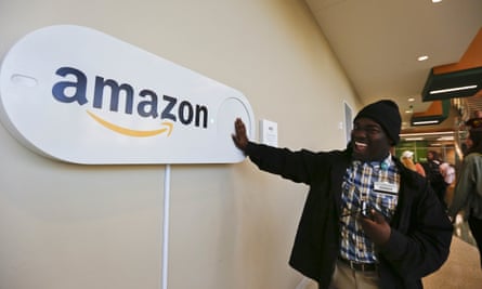 A student at the University of Alabama pushes a large Amazon Dash button, which was part of Birmingham’s campaign to lure Amazon’s second headquarters.