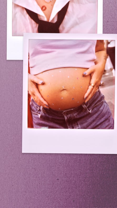 Close-up of a pregnant woman’s belly.