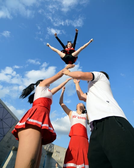In the capital city, Astana, senior members of the Cheer Kazakhstan elite national cheerleading team and junior members of the Cheer Republic team perform in Independence Square 