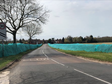 A hedge covered with netting in Alveston near Stratford-upon-Avon.