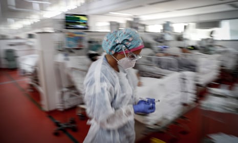 Medical personnel work at the ICU of the M’Boi Mirim Hospital, in Sao Paulo, Brazil.
