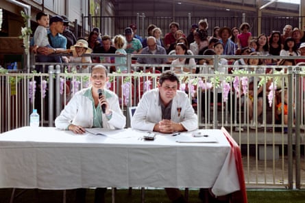 Judges at Pig Handling Competition