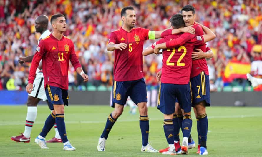 Álvaro Morata (far right) is congratulated on opening the scoring for Spain
