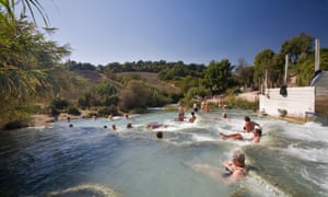 Group of people enjoying the hot spring aty, Saturnia, Group of people enjoying in a hot spring