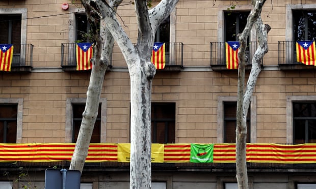 Catalan flags hang from balconies in Barcelona