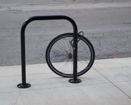 Just the front wheel remains locked to a cycle hoop after a bike has been stolen