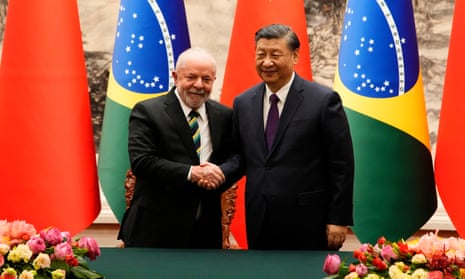 Luiz Inacio Lula da Silva, left, with Xi Jinping after a signing ceremony in Beijing