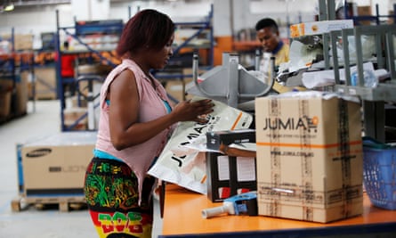 An employee in the packaging unit at a Jumia warehouse in Lagos