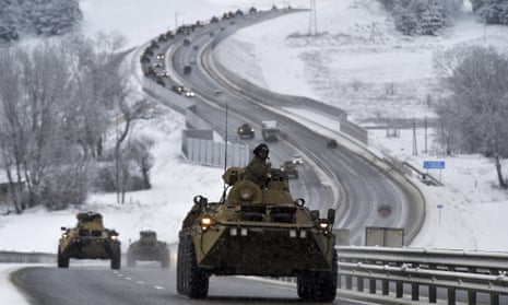 A convoy of Russian armoured vehicles on a road in Crimea this week