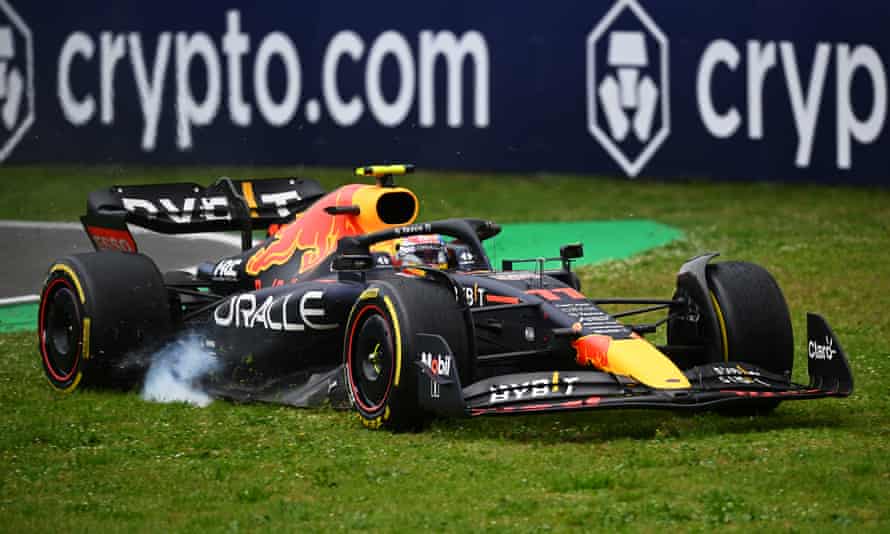 Sergio Perez runs wide.