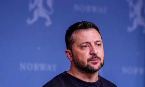 Volodymyr Zelenskiy attends a joint press conference with Norway's prime minister, Jonas Gahr Store , in Oslo, on 13 December 2023.