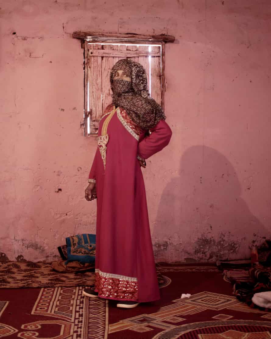 Umm Yasser, the first female Bedouin guide from the Hamada tribe, poses for a photograph in her home in Wadi Sahw, Abu Zenima, Egypt