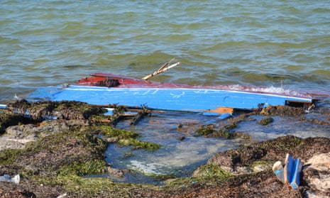 Remains of a boat, from a previous incident, carrying migrants from Libya that sank off south-east Tunisia.