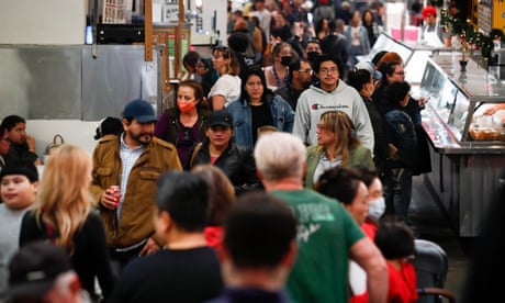 People gather at Grand Central Market in Los Angeles, California. Evidence of increase in Covid cases in the US was seen in earnest after Thanksgiving.