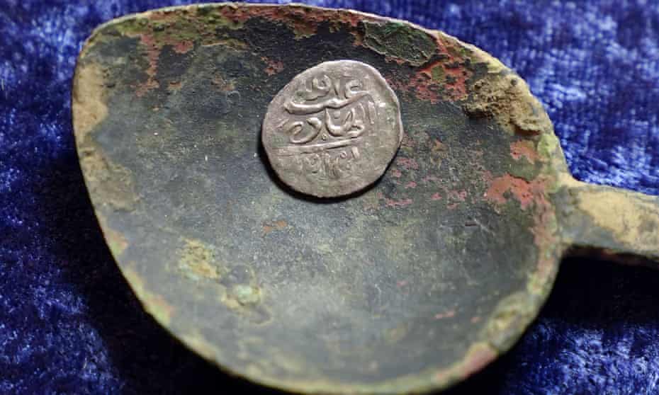 A 17th-century Arabian silver coin that research shows was struck in 1693 in Yemen.