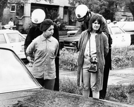 Two women being arrested.