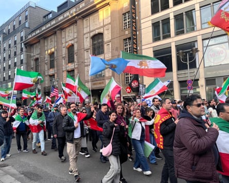 Jubilant members of the large Iranian diaspora marched down Berlin’s Friedrichstraße, their flags whipping in the spring sunshine.