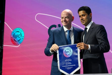 Nasser Al-Khelaifi (right) and Fifa President Gianni Infantino pose with a European Football Clubs pennant