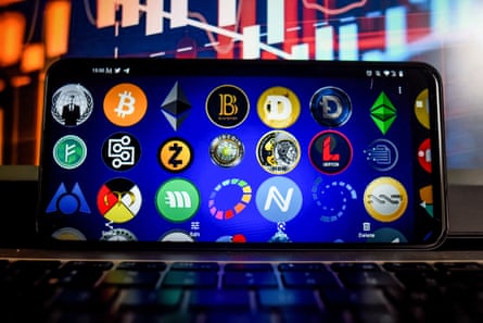 Crypto logos on a smartphone.