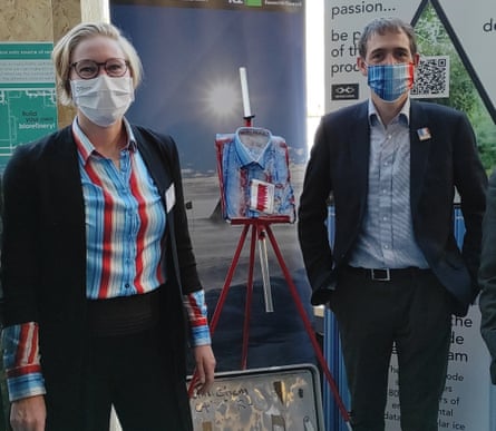 Pilvi Muschitiello (left) and Ed Hawkins model the climate data shirt and mask at its launch at COP26 in Glasgow