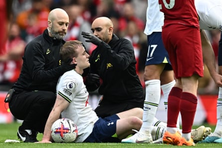Oliver Skipp is treated after a collision with Diogo Jota which Ryan Mason felt warranted a red card for Liverpool’s eventual matchwinner.