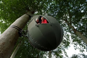 Borgloon, Belgium: guests try out a teardrop-shaped tent created by Dutch artist Dre Wapenaar