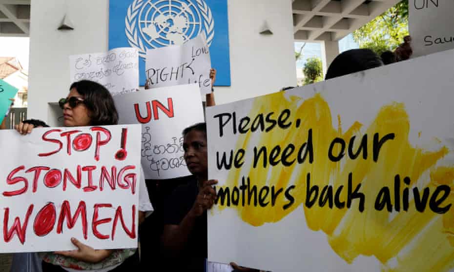 Sri Lankan human rights activists protest against the sentence of death by stoning meted out to a Sri Lankan woman accused of adultery by a Saudi court.