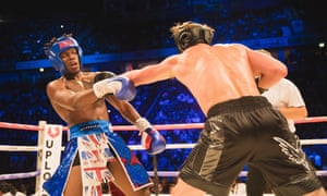 ‘Fans just want to see YouTubers — and want to see them do anything’ … Logan Paul takes a swing at KSI during their Manchester Arena fight on 25 August.