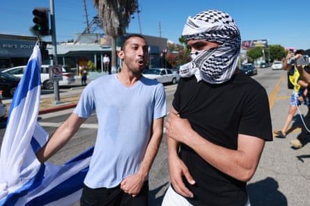 A pro-Israel protester confronts a pro-Palestinian protester