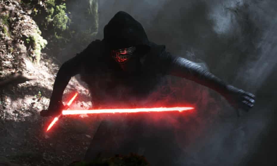 A man wears a Star Wars character “Kylo Ren” outfit during a party in downtown Rome on December 15, 2015 on the eve of the premiere of the Disney movie. The latest installment of the Star Wars series opens in cinemas in France, Italy and other European countries at the start of a global rollout of the film, whose plot has been kept under wraps by producers Disney. / AFP / FILIPPO MONTEFORTEFILIPPO MONTEFORTE/AFP/Getty Images