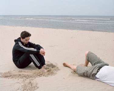 Julian and Jonathan, May 2016”Jonathan was 15 years old here, and by then, his relationship with Julian had shifted and changed significantly. He was distancing himself from his father, and it became increasingly difficult to get close to him. It felt as though he was building a wall around himself.When I took this photograph, I wasn’t consciously aware of the traces in the sand around Jonathan’s feet. But when I saw the image later, they seemed to resemble a mental wall made visible.